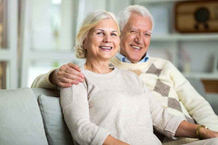 Senior couple in their condo rental