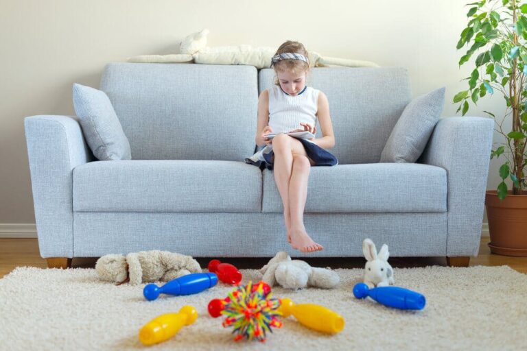 toys covering living room floor