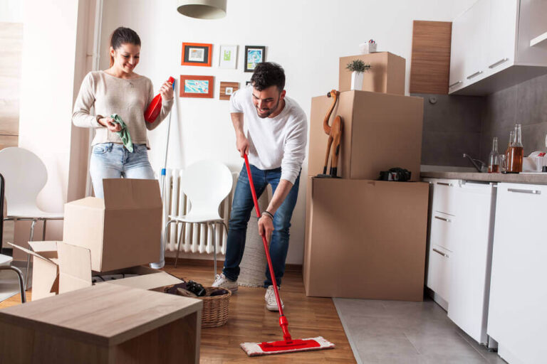 couple cleaning rental before moving